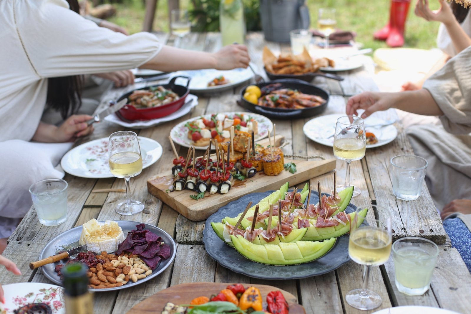 Supportive Group Of People Enjoying Meal